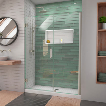 Unidoor-LS Frameless Hinged Shower Door with L-Bar for 24 inch Stationary Panel in Brushed Nickel, installed in a bathroom