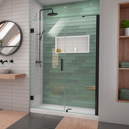 Unidoor-LS Frameless Hinged Shower Door with L-Bar for 24 inch Stationary Panel in Satin Black, installed in a bathroom