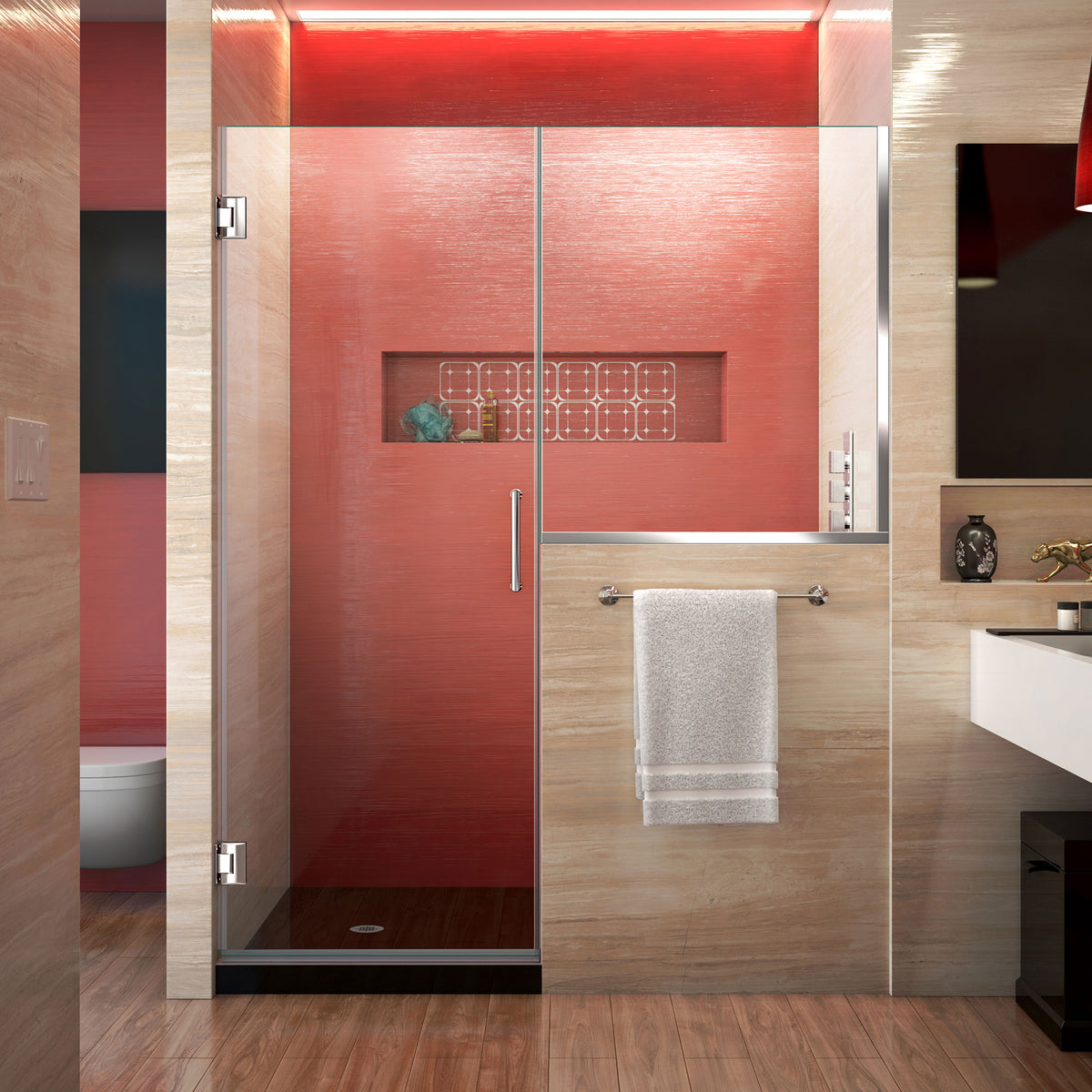 Unidoor Plus Frameless Hinged Shower Door with 34 inch high Stationary Half Panel for Pony Wall in Polished Chrome, installed in a bathroom