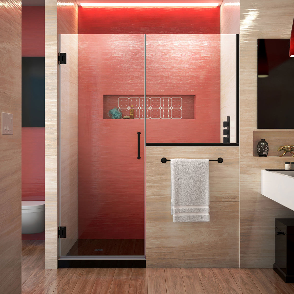 Unidoor Plus Frameless Hinged Shower Door with 36 inch high Stationary Half Panel for Pony Wall in Satin Black, installed in a bathroom