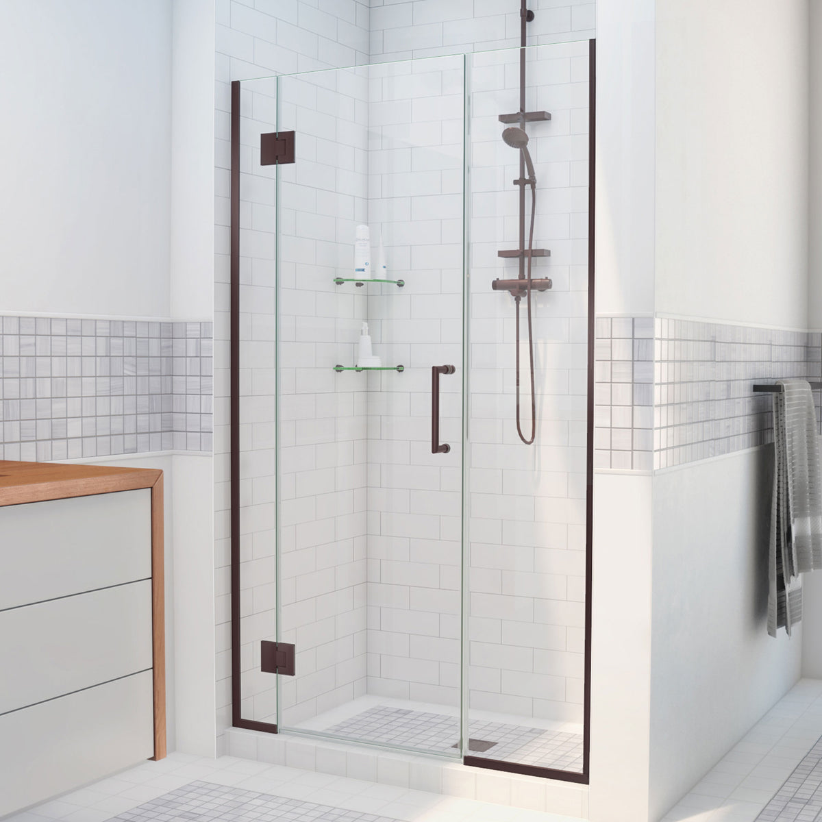 Unidoor-X frameless hinged shower door with 14 inch inline panel in Oil Rubbed Bronze, 3/8 inch clear tempered glass