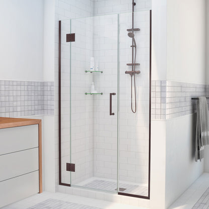 Unidoor-X frameless hinged shower door with 14 inch inline panel in Oil Rubbed Bronze, 3/8 inch clear tempered glass