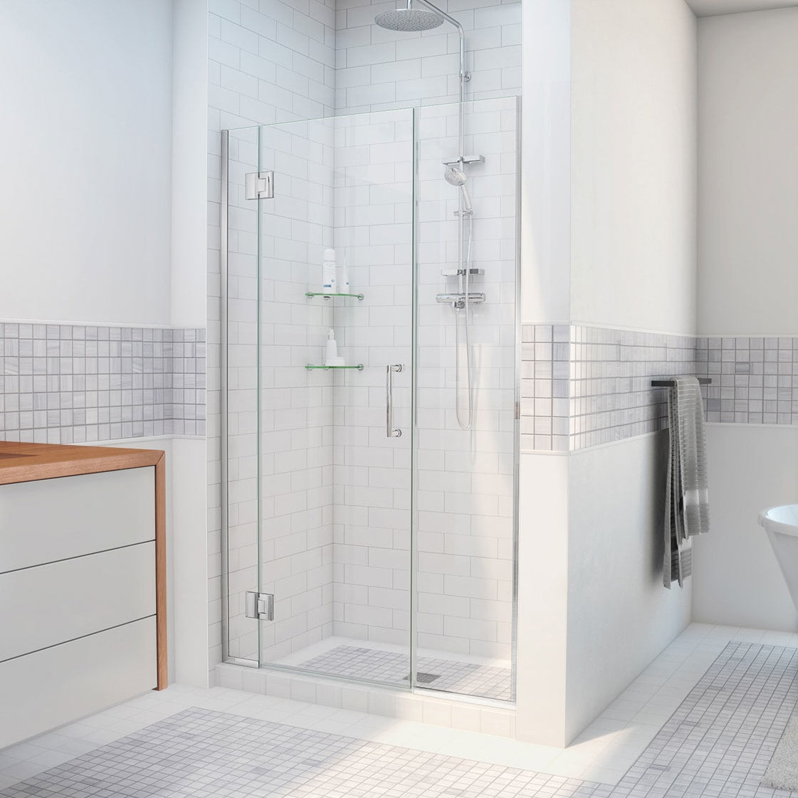 Unidoor-X frameless hinged shower door with 14 inch inline panel shown in a bathroom setting in Polished Chrome