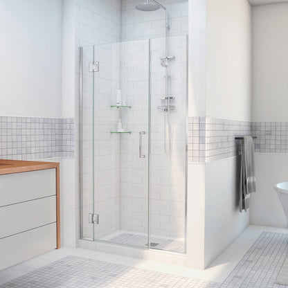 Unidoor-X frameless hinged shower door with 14 inch inline panel shown in a bathroom setting in Polished Chrome