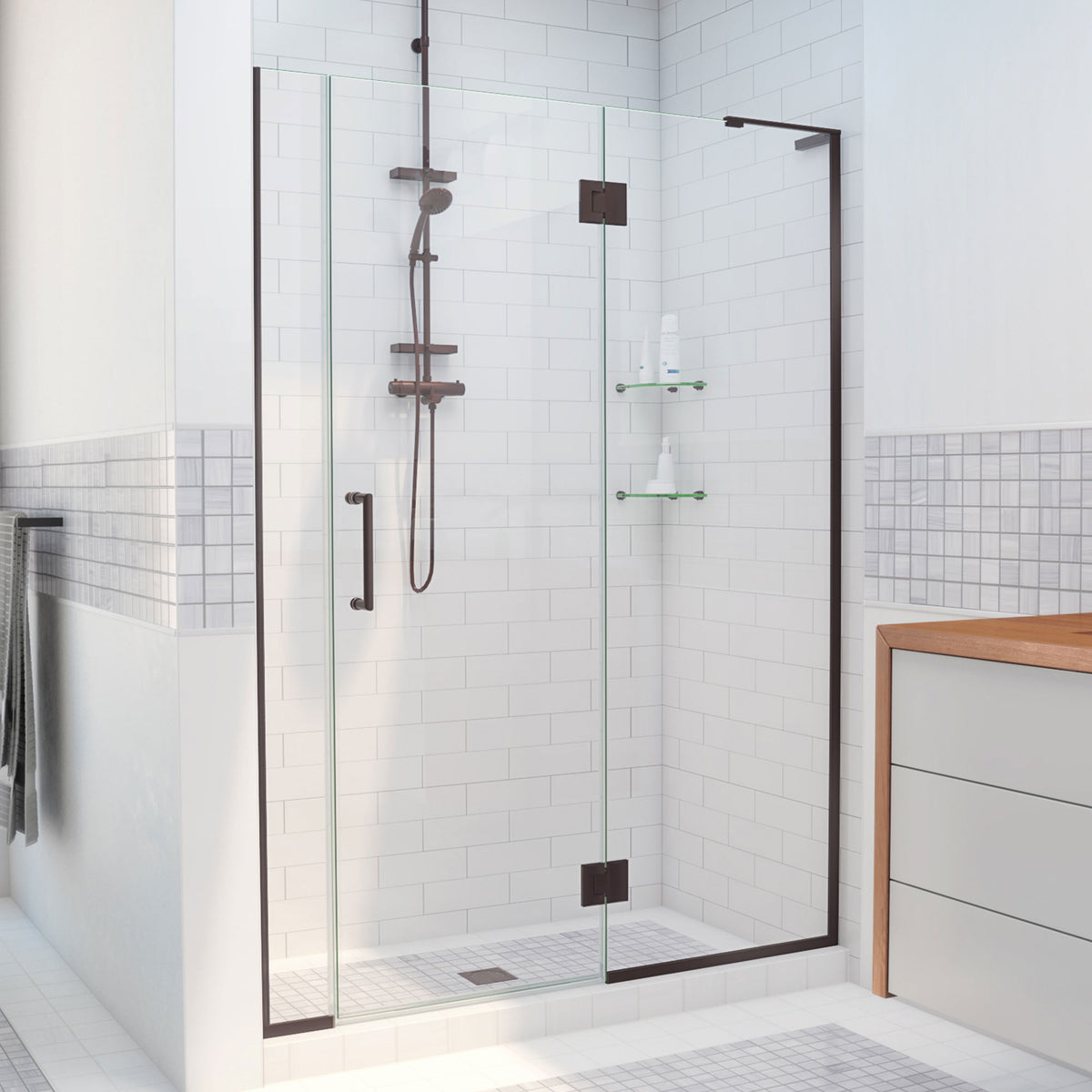Unidoor-X frameless hinged shower door with 24 inch hinged panel and 6 inch inline panel for right wall installation in Oil Rubbed Bronze, 3/8 inch clear tempered glass