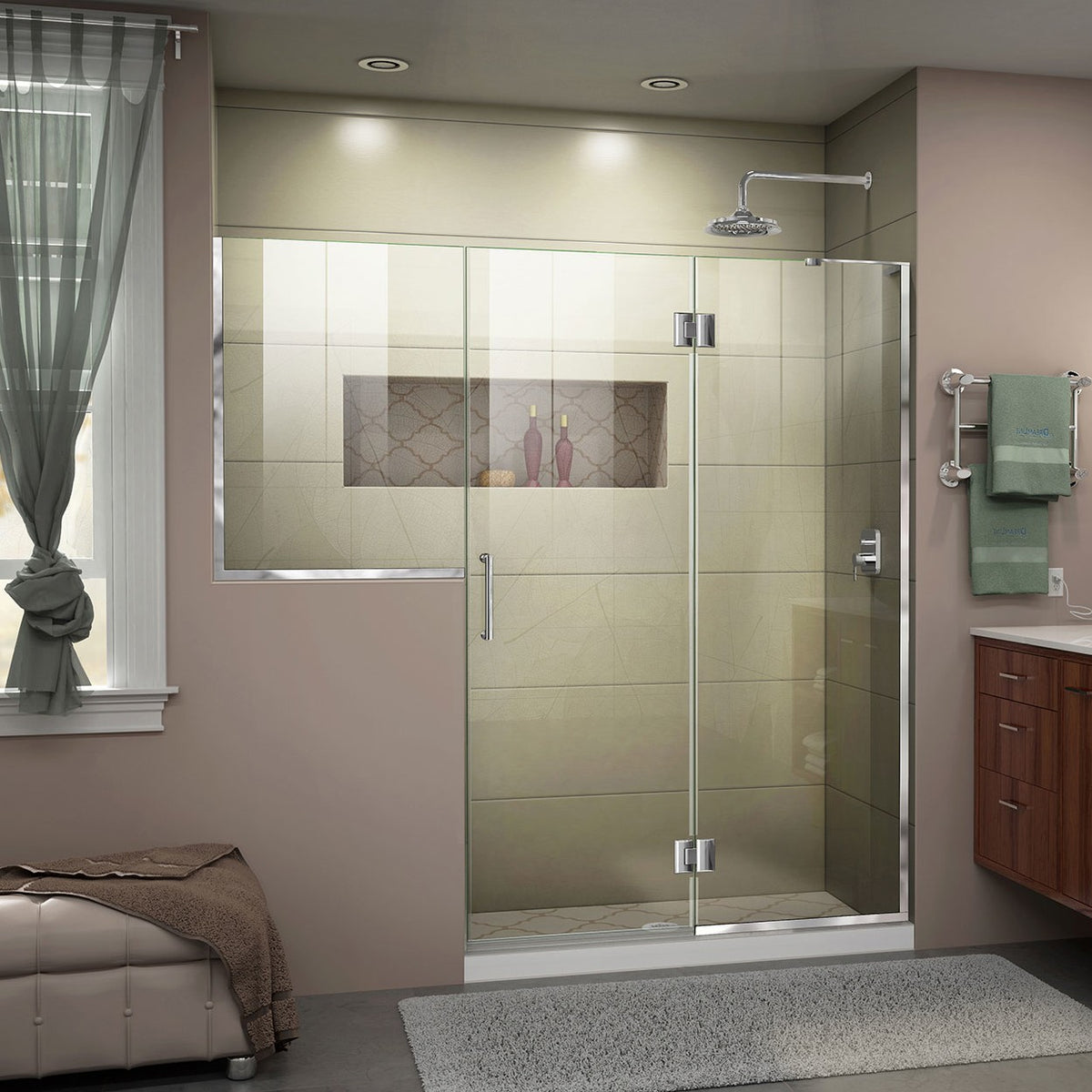 Unidoor-X frameless hinged shower door with 24 inch hinged panel and inline buttress panel for right wall installation shown in a bathroom setting in Polished Chrome
