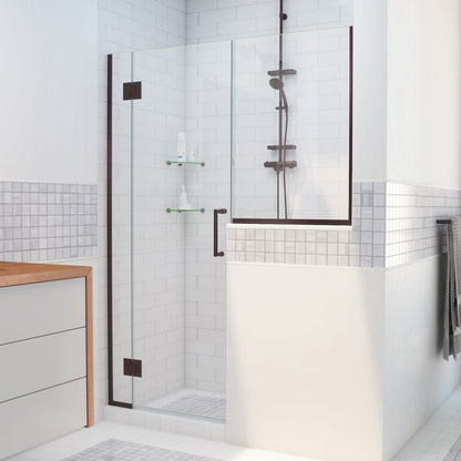 Unidoor-X frameless hinged shower door with 34 inch high inline buttress panel in Oil Rubbed Bronze, 3/8 inch clear tempered glass