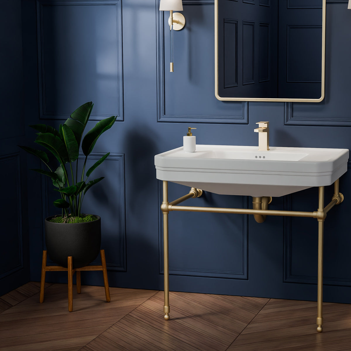 Valencia 31 inch console bathroom sink with Brushed Brass legs in a navy powder room, angled view