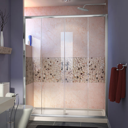 Visions double sliding shower door kit in polished chrome with biscuit shower base pan and center drain
