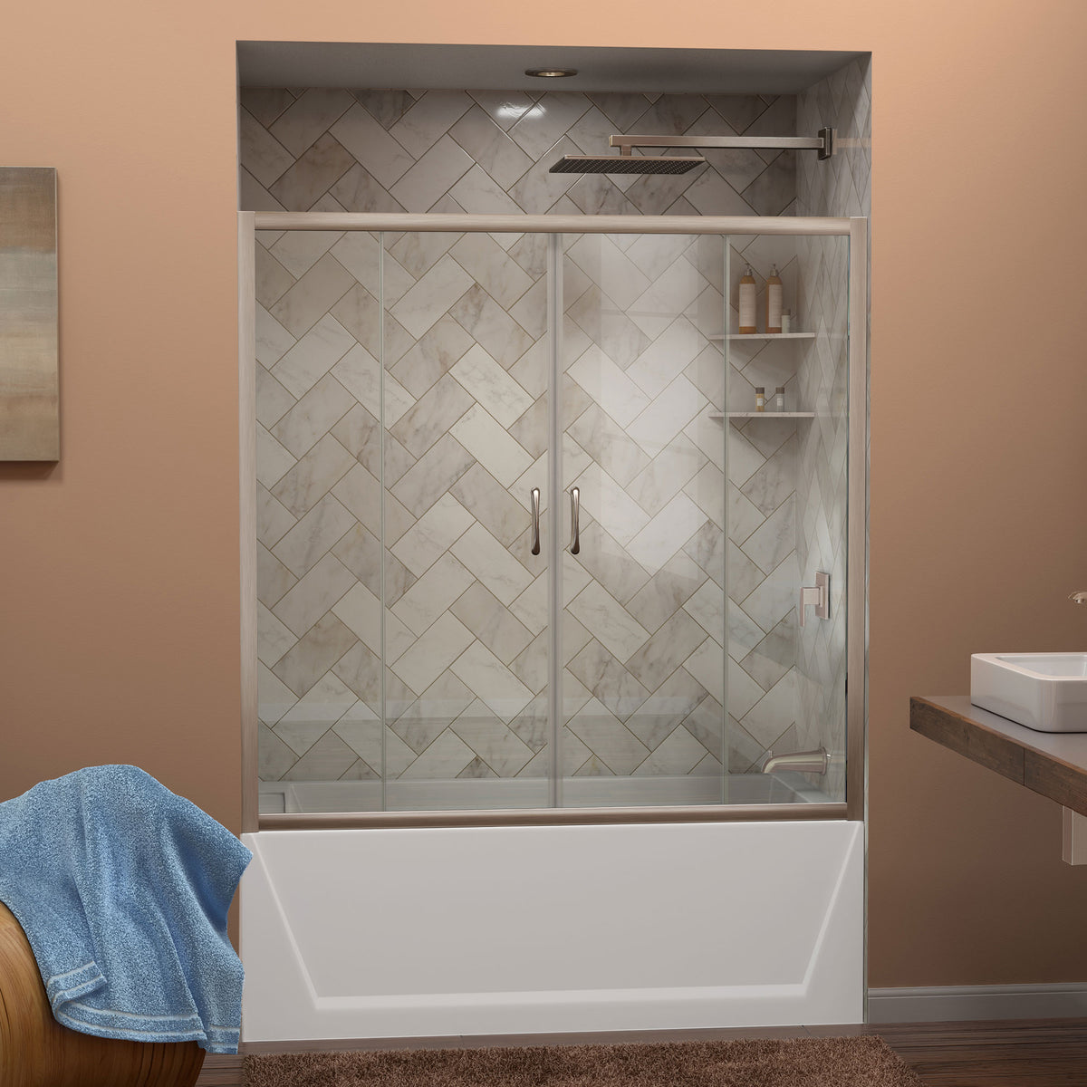 Visions semi-frameless sliding tub door in brushed nickel on an alcove bathtub