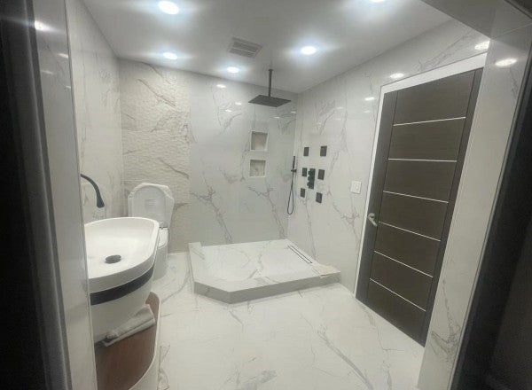 Calacatas Azure marble composite shower wall panel, cool azure gray veining on white