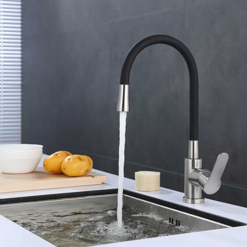 Bertil kitchen faucet with flexible black spout in Brushed Nickel with Matte Black Spout, installed over a kitchen sink