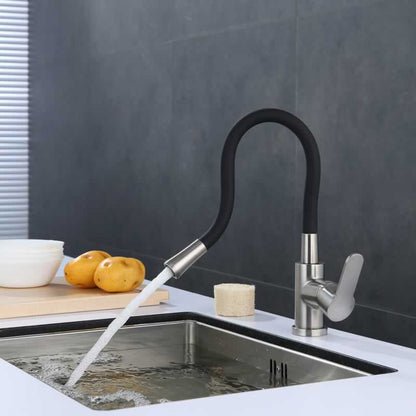 Bertil kitchen faucet with flexible black spout in Brushed Nickel with Matte Black Spout, installed over a kitchen sink