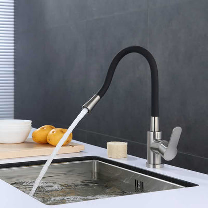 Bertil kitchen faucet with flexible black spout in Brushed Nickel with Matte Black Spout, installed over a kitchen sink