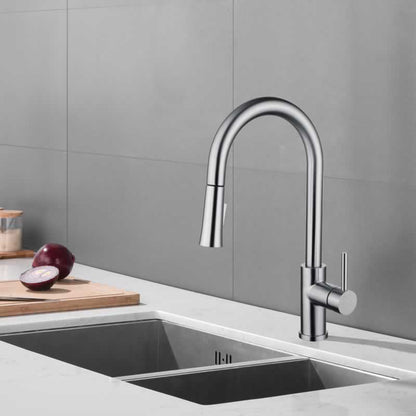 Halvard pull down kitchen faucet in Brushed Nickel, installed over a kitchen sink
