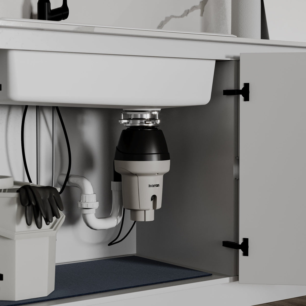 Ashworth continuous feed kitchen garbage disposal, 1/2 HP, installed under a kitchen sink