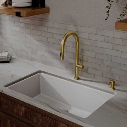 Brynford slim pull down kitchen faucet in Spot-Free Brushed Gold, installed in a kitchen