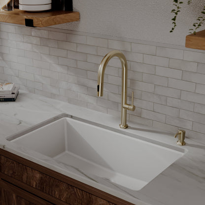 Brynford slim pull down kitchen faucet in Spot-Free Champagne Bronze, installed in a kitchen