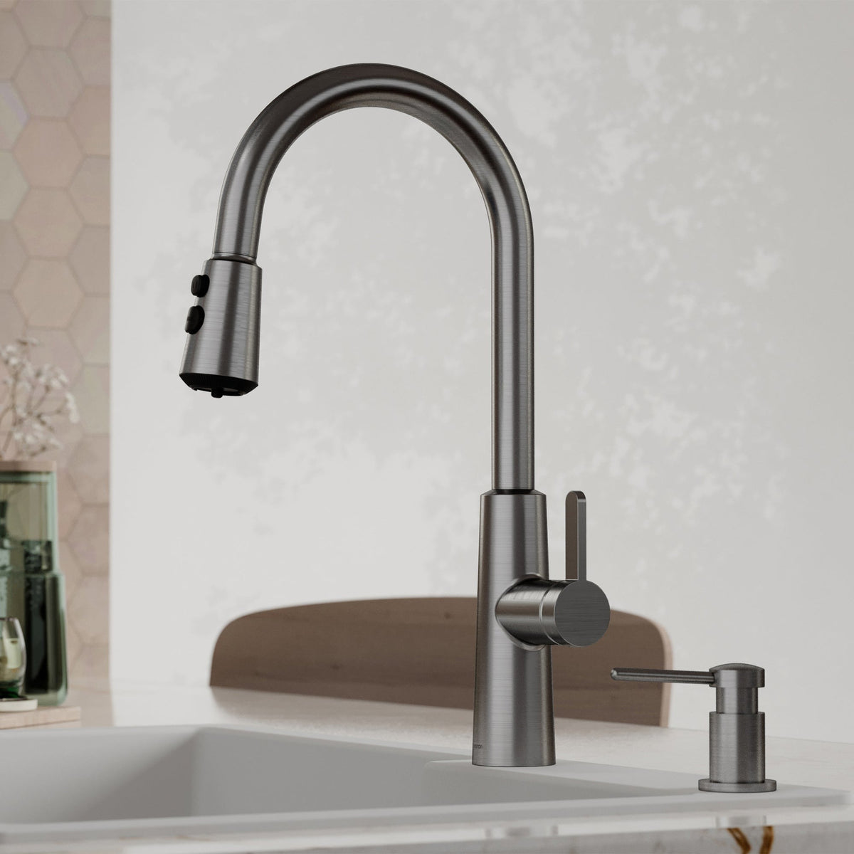Elmsworth pull down kitchen faucet in Spot-Free Gunmetal Grey, installed in a kitchen