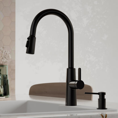 Elmsworth pull down kitchen faucet in Matte Black, installed in a kitchen with the alternate spray head