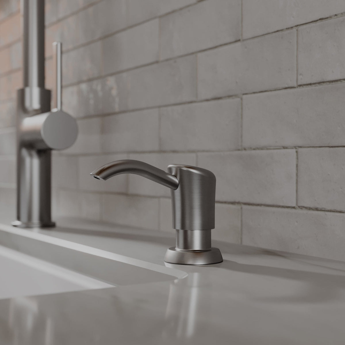 Ludlow kitchen soap dispenser in Spot-Free Stainless Steel, installed beside a kitchen faucet