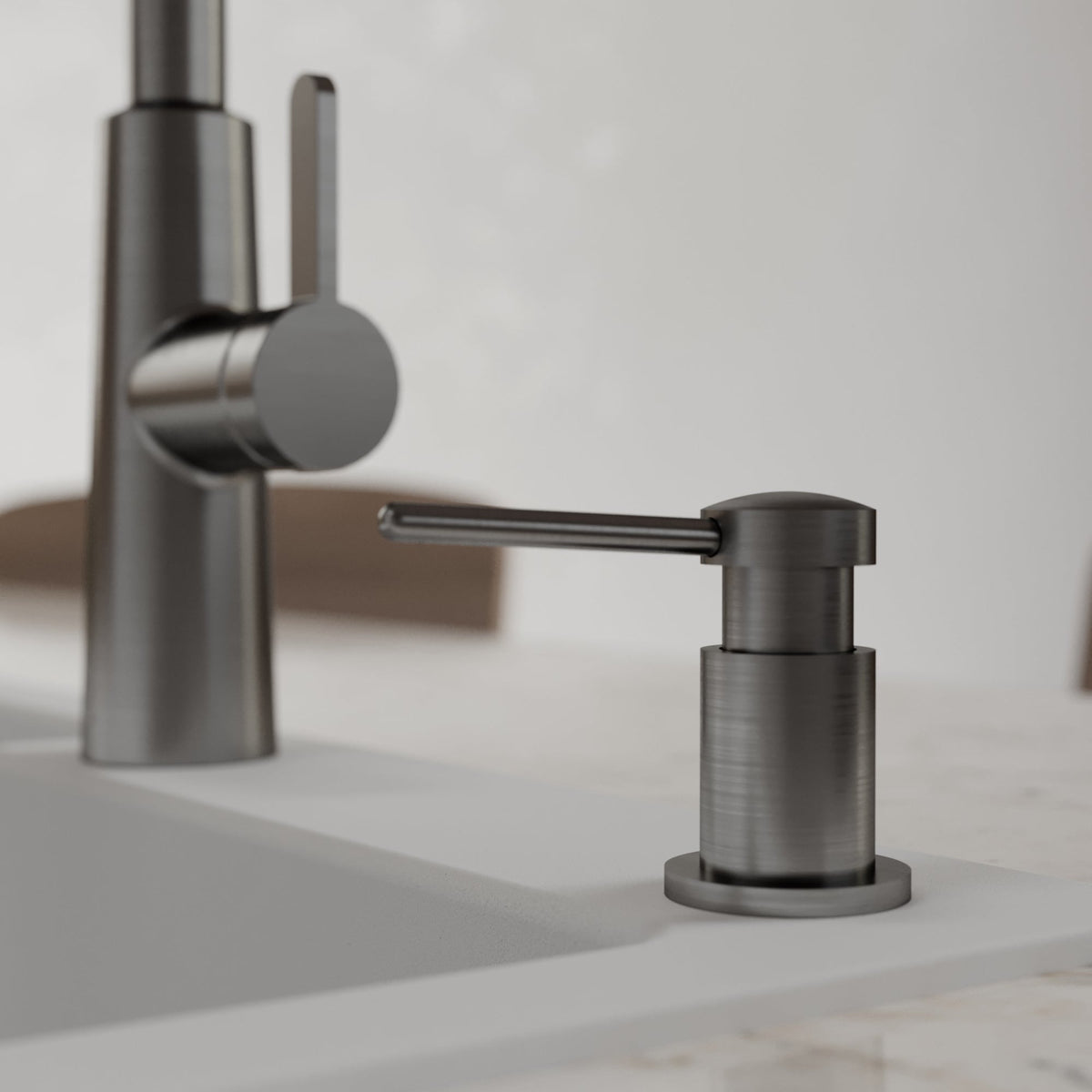 Pembrey kitchen soap dispenser in Spot-Free Gunmetal Grey, installed beside a kitchen faucet