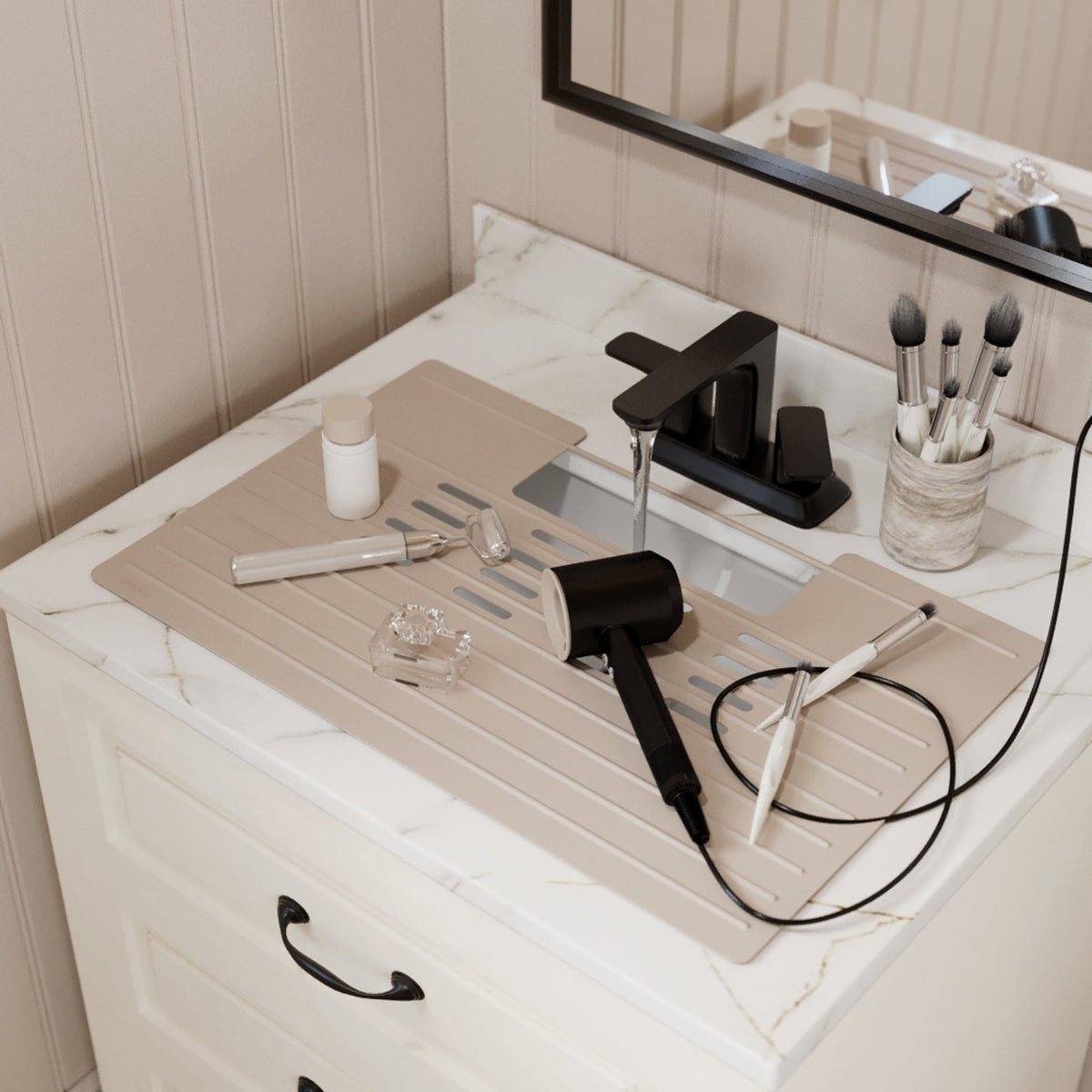 Roll up silicone vanity bowl mat in Grey, laid over a bathroom sink