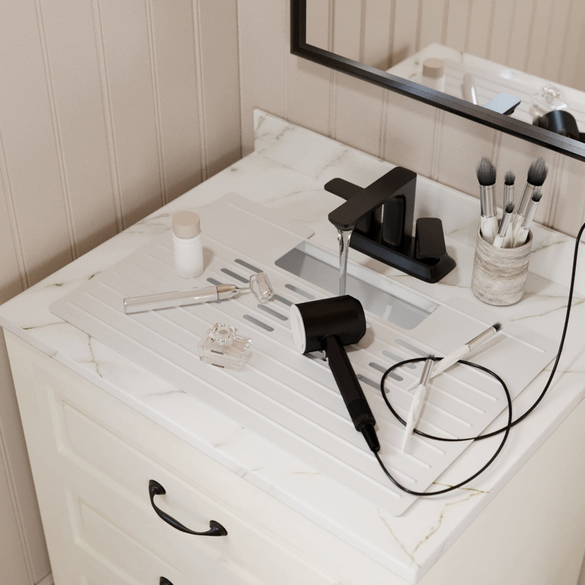 Roll up silicone vanity bowl mat in White, laid over a bathroom sink