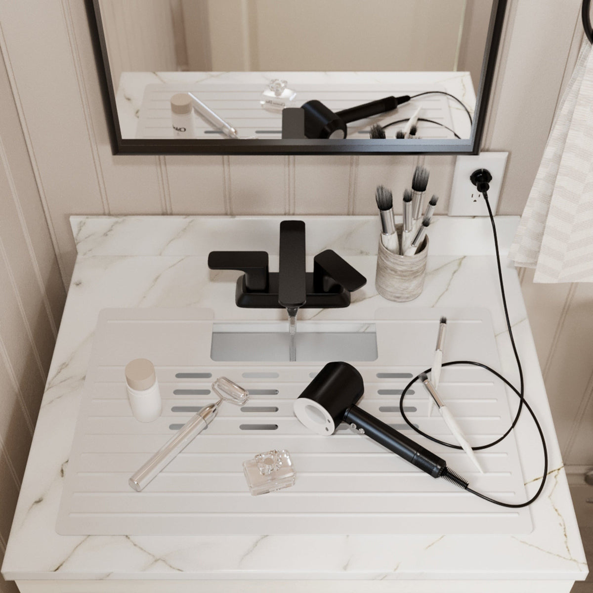 Roll up silicone vanity bowl mat in White, laid over a bathroom sink