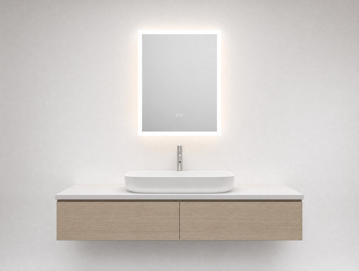 Halo Sensor LED Mirror, square corner frameless mirror with front-lit glowing edge over an oak floating vanity