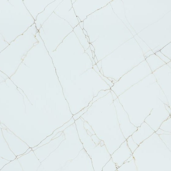 Hidden Aurum engineered quartz slab, bright white base with fine gold veining, polished finish
