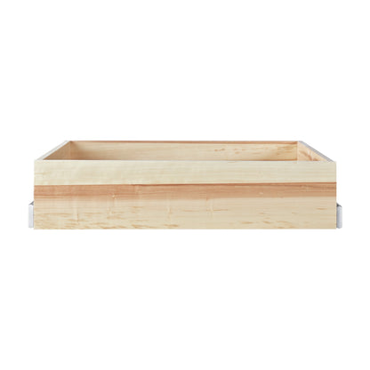 Natural wood roll out tray for a base cabinet, side view