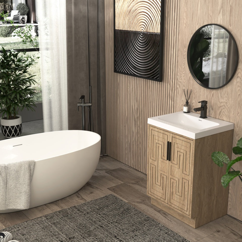 Bella Geometric 24 inch freestanding bathroom vanity with carved geometric doors in a styled bathroom