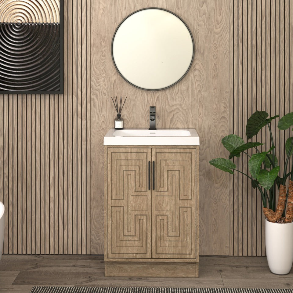 Bella Geometric 24 inch freestanding bathroom vanity with carved geometric doors in a styled bathroom