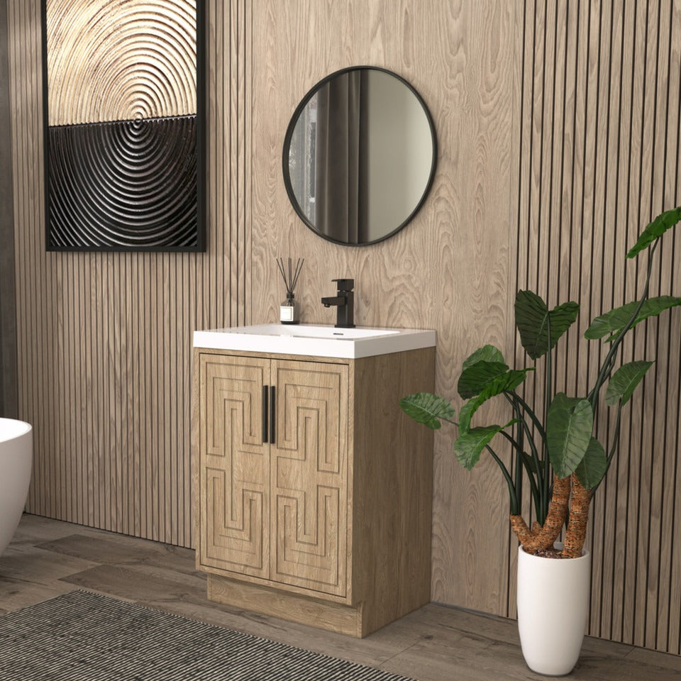 Bella Geometric 24 inch freestanding bathroom vanity with carved geometric doors in a styled bathroom