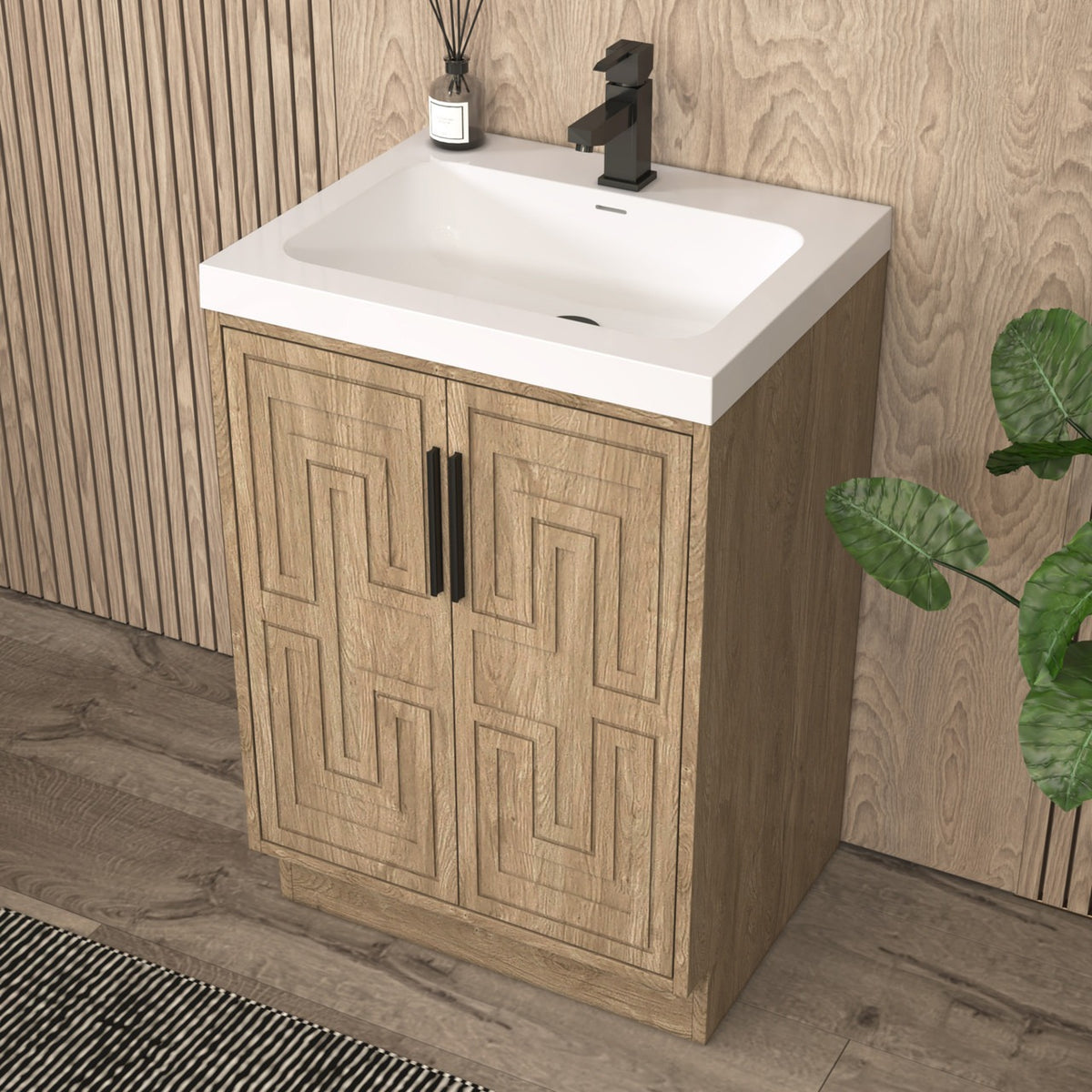 Bella Geometric 24 inch freestanding bathroom vanity with carved geometric doors in a styled bathroom