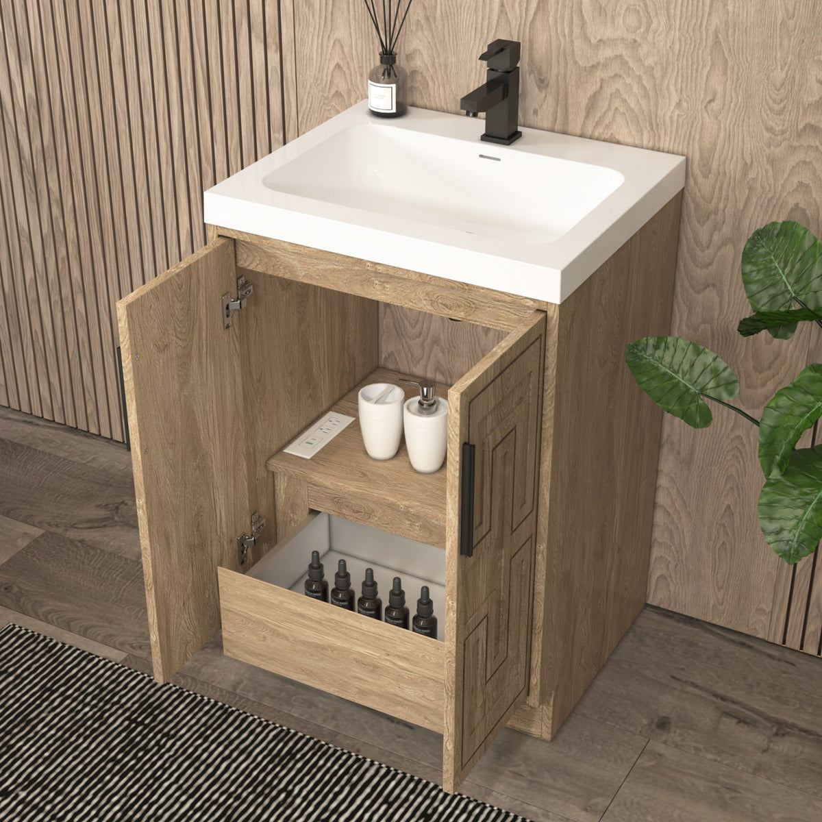 Bella Geometric 24 inch freestanding bathroom vanity with carved geometric doors in a styled bathroom