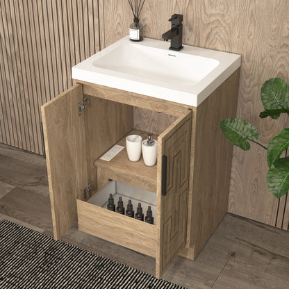 Bella Geometric 24 inch freestanding bathroom vanity with carved geometric doors in a styled bathroom
