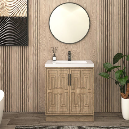 Bella Geometric 30 inch freestanding bathroom vanity with carved geometric doors in a styled bathroom