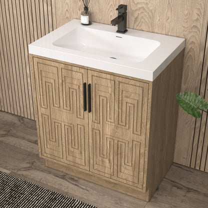 Bella Geometric 30 inch freestanding bathroom vanity with carved geometric doors in a styled bathroom