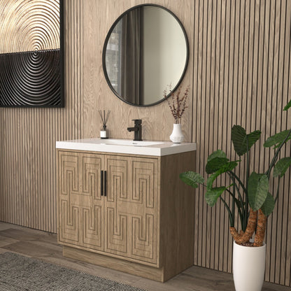 Bella Geometric 36 inch freestanding bathroom vanity with carved geometric doors in a styled bathroom