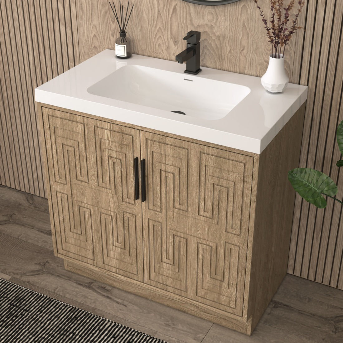 Bella Geometric 36 inch freestanding bathroom vanity with carved geometric doors in a styled bathroom