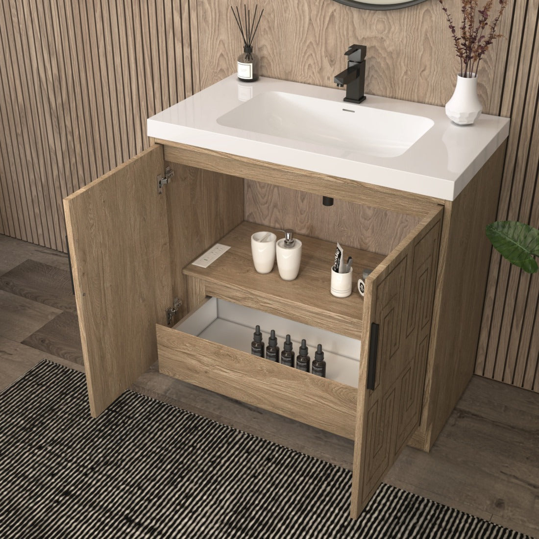 Bella Geometric 36 inch freestanding bathroom vanity with carved geometric doors in a styled bathroom