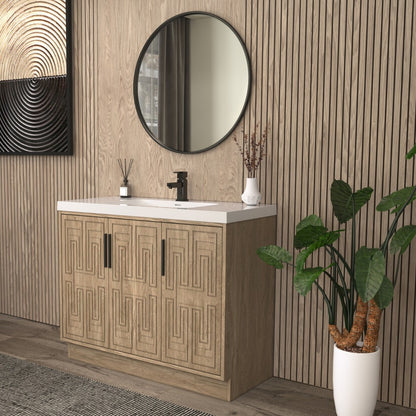 Bella Geometric 42 inch freestanding bathroom vanity with carved geometric doors in a styled bathroom
