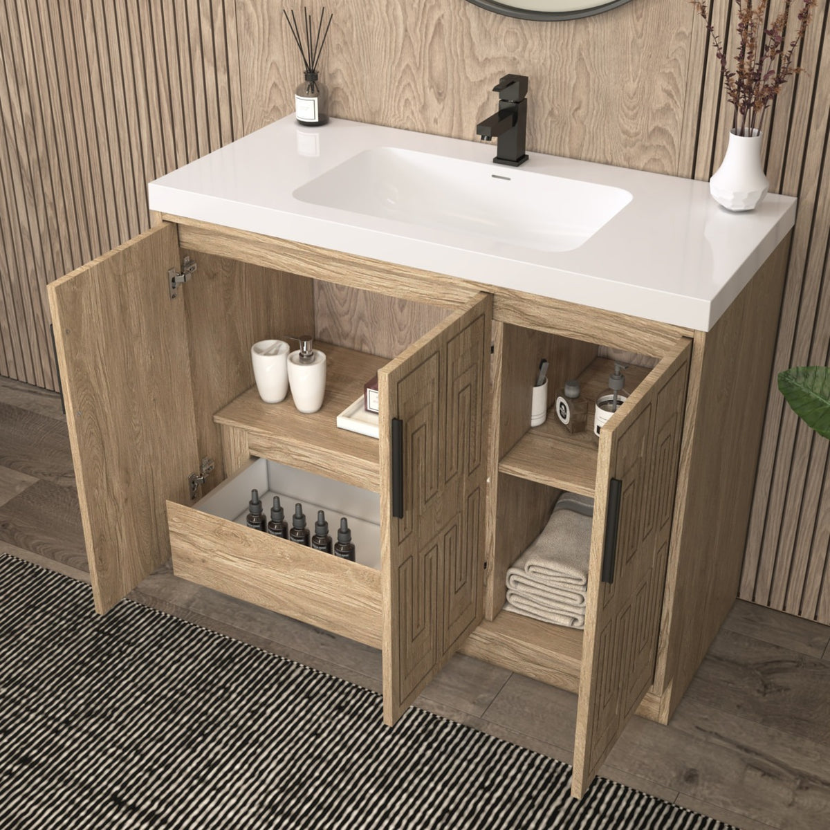 Bella Geometric 42 inch freestanding bathroom vanity with carved geometric doors in a styled bathroom