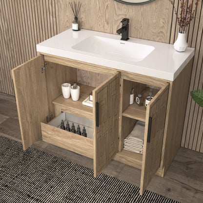Bella Geometric 42 inch freestanding bathroom vanity with carved geometric doors in a styled bathroom