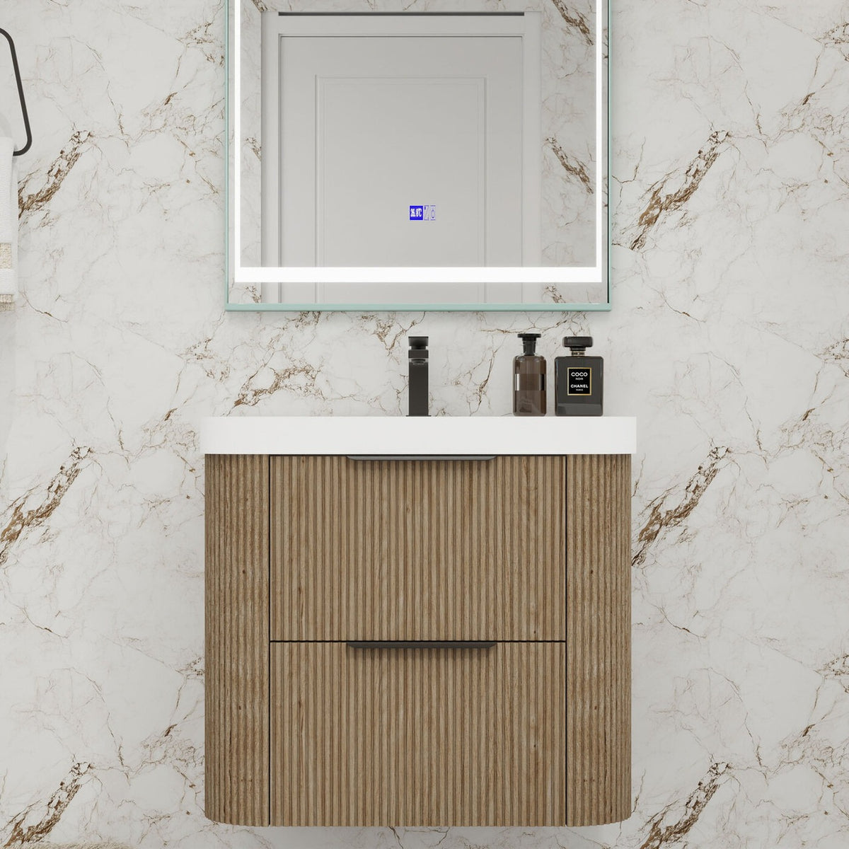 Celine 24 inch fluted wall mounted bathroom vanity with rounded corners in a styled bathroom