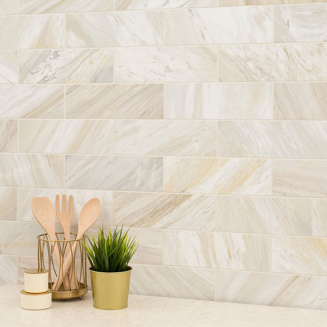 Athena Gold Marble Tile installed in a room setting