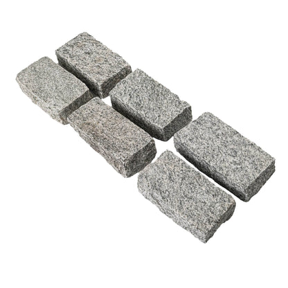 Belgian Block Gray granite cobblestone, close up product view showing color and texture