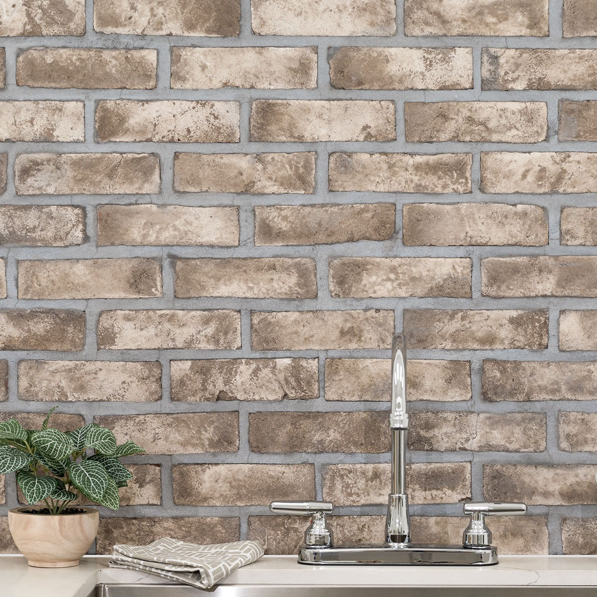 BrickStaks Doverton Gray 2.25x7.5 Brick Clay Mosaic installed in a finished room